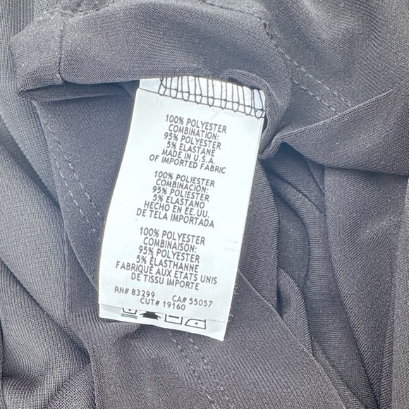 Classic Black Sleeveless Mini Dress with Pearl-Trim Neckline - Picture 8 of 9